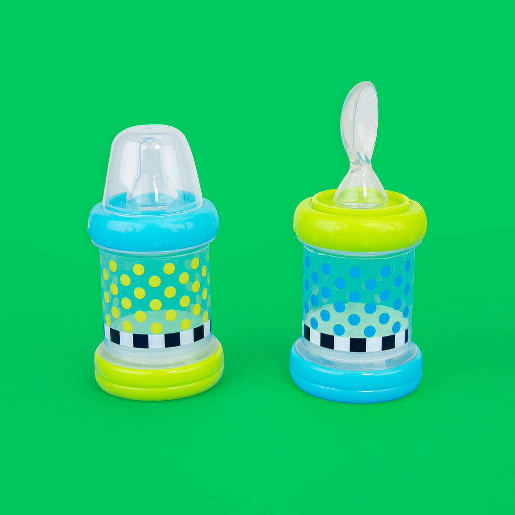 baby bottle and bottle with a spoon attachment green and blue polka-dots