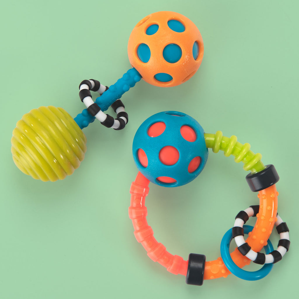 Two multicolored rattles one as a barbell and one a ring rattle