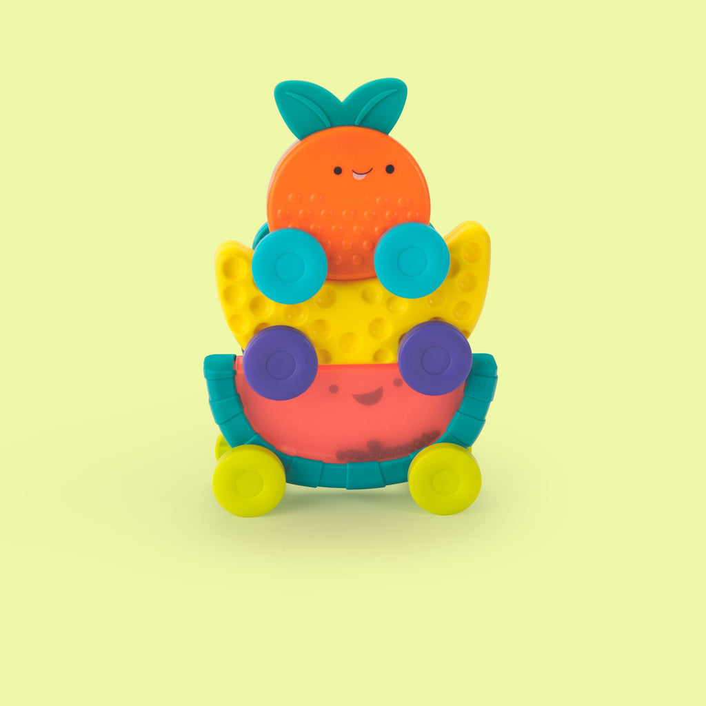 
a three-piece set of fruit-inspired stacking cars. the top car is an orange character with wheels, the second is a banana character featuring an indented hole texture and wheels, and the last car is inspired by watermelon, partially translucent with black beads inside and a textured rind and wheels