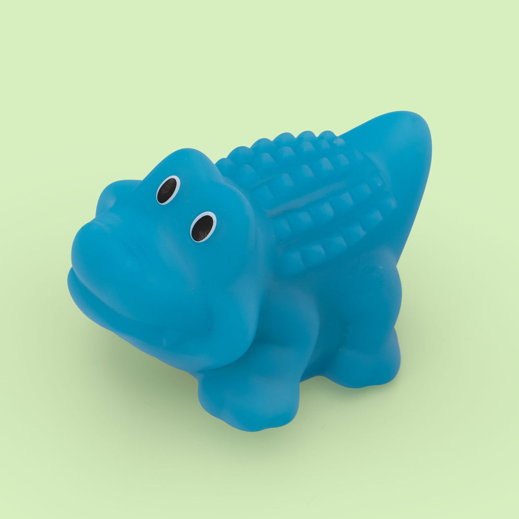 Blue alligator bath toy with big eyes