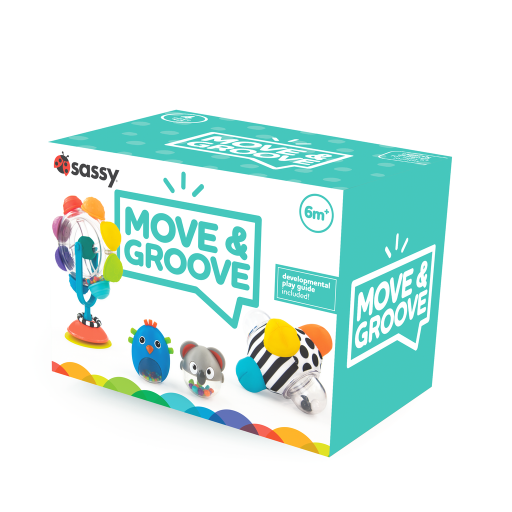 "move and groove" baby box with Rainbow Reel spinning tray toy with colorful bumps and beads on the inside. Two animal rattles one bird and one rattle. Black and white bumpy ball with colorful bumps.