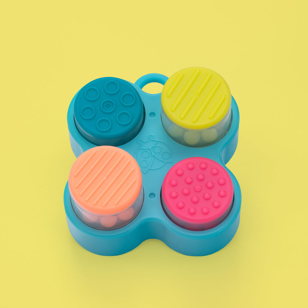 pop n pods toy shown overhead on a yellow background